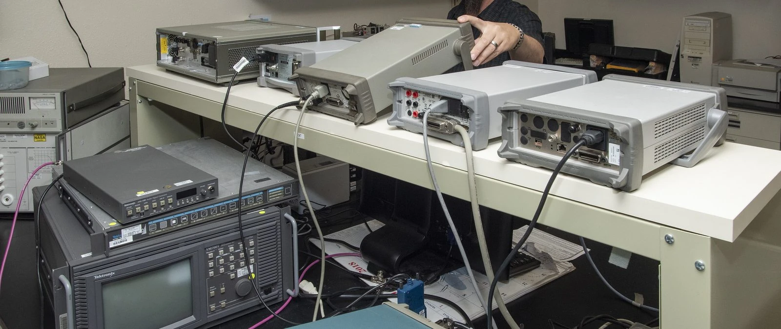 Calibration laboratory bench with test and measurement instruments